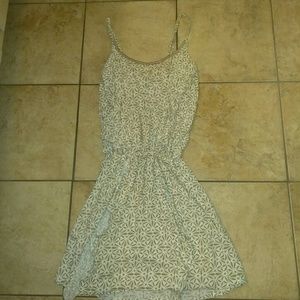 A Super Cute cream and white romper